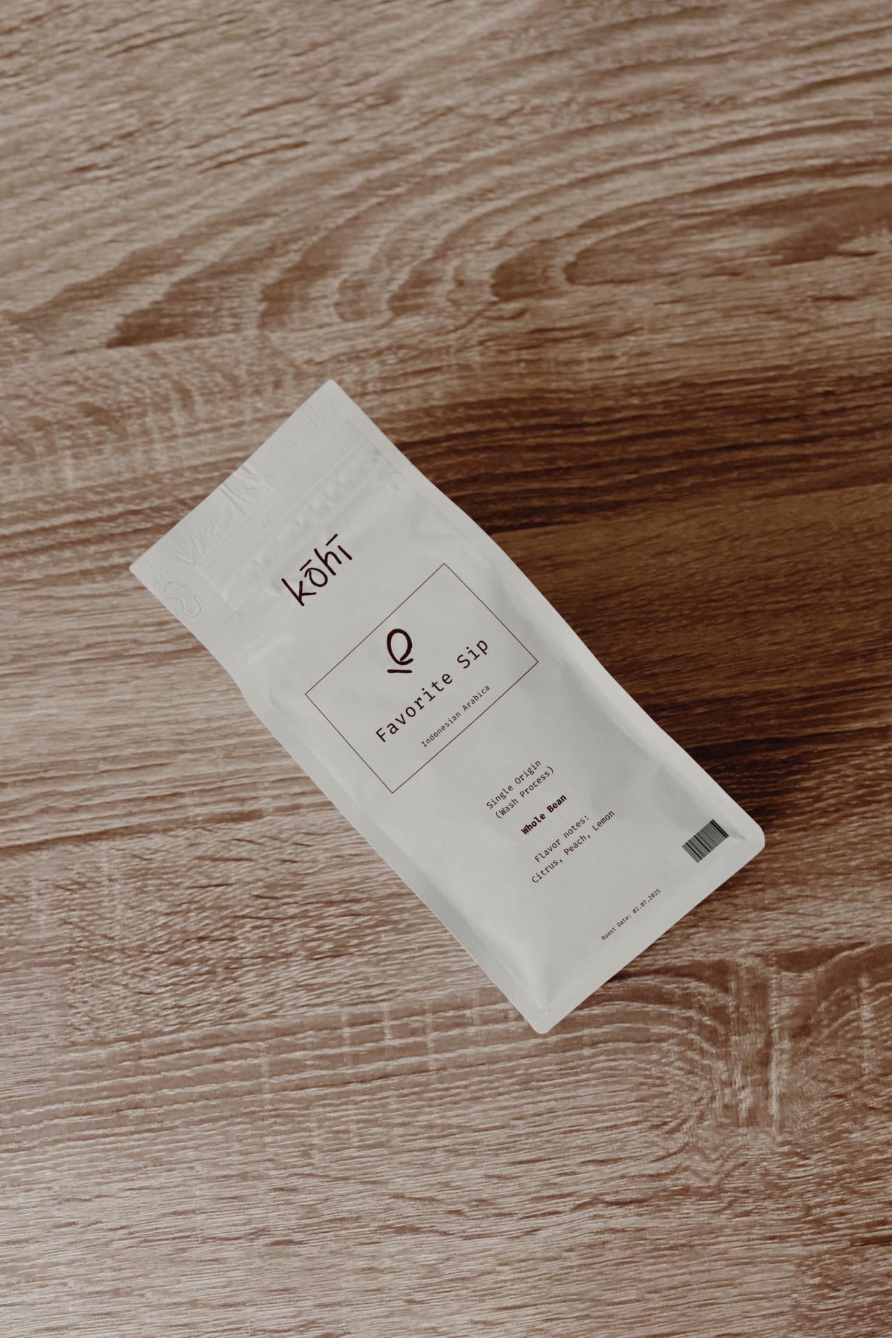 Kohi Favorite Sip single origin coffee bag packaging placed on wooden surface